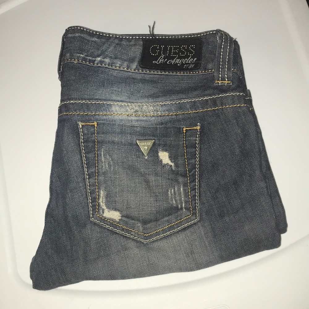 *donated*. Guess distressed jeans. Size 28.